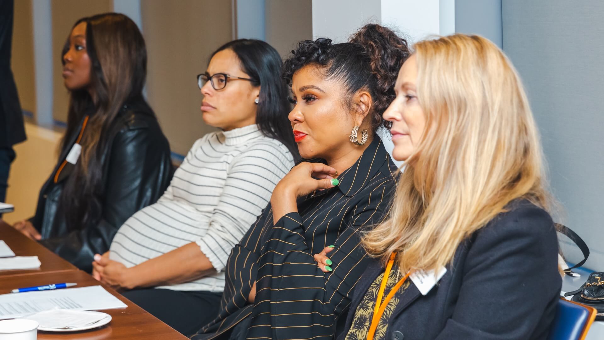 START founders seated together during a panel discussion